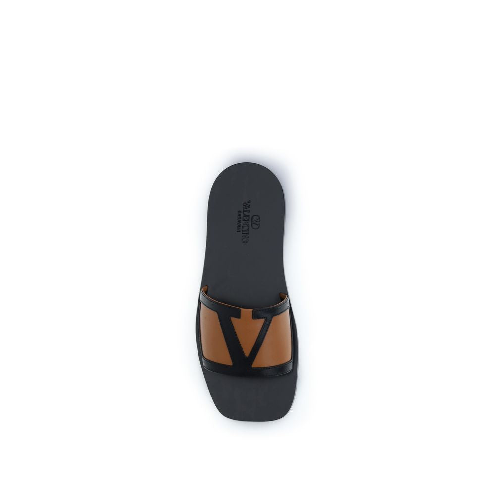Valentino Garavani Sorte Flate Sandaler i Kalveskinn