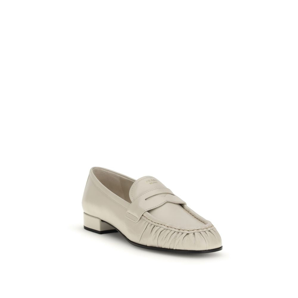 Prada beige kalveskinn Bos Taurus slip-on pensko