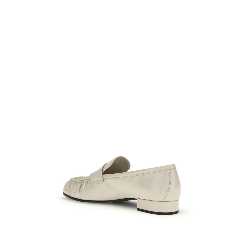 Prada beige kalveskinn Bos Taurus slip-on pensko