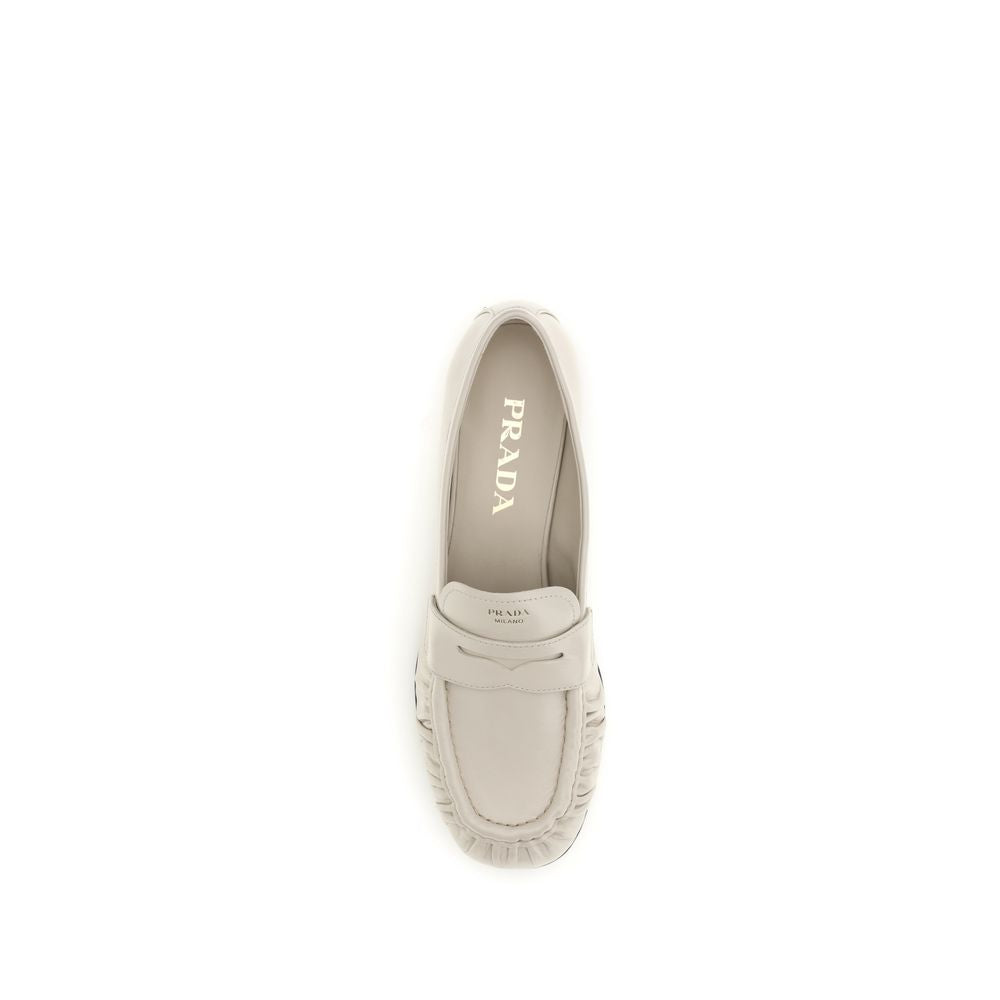 Prada beige kalveskinn Bos Taurus slip-on pensko