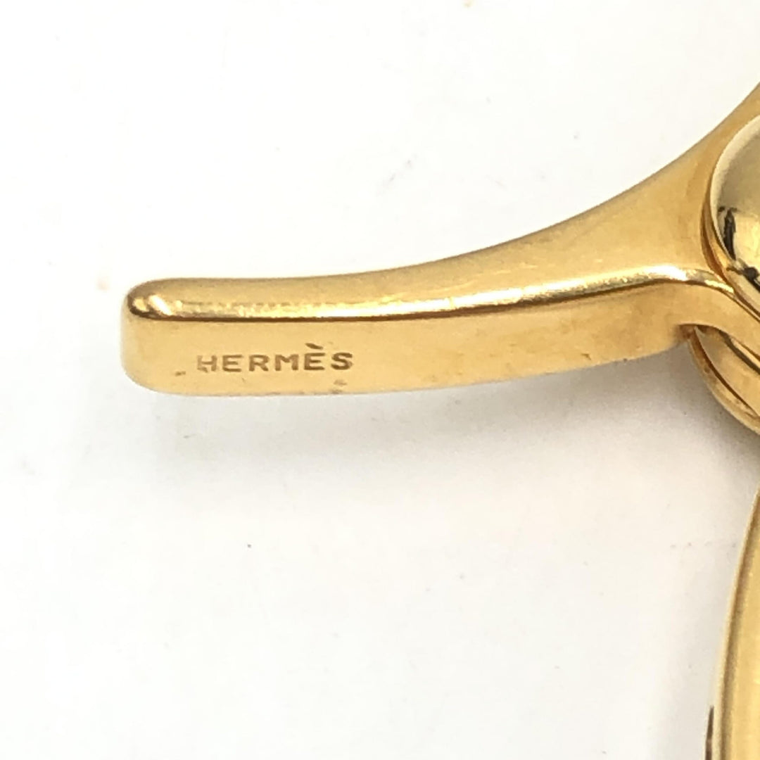 Hermès nøkkelring med hanskeholder i gullfarget metall