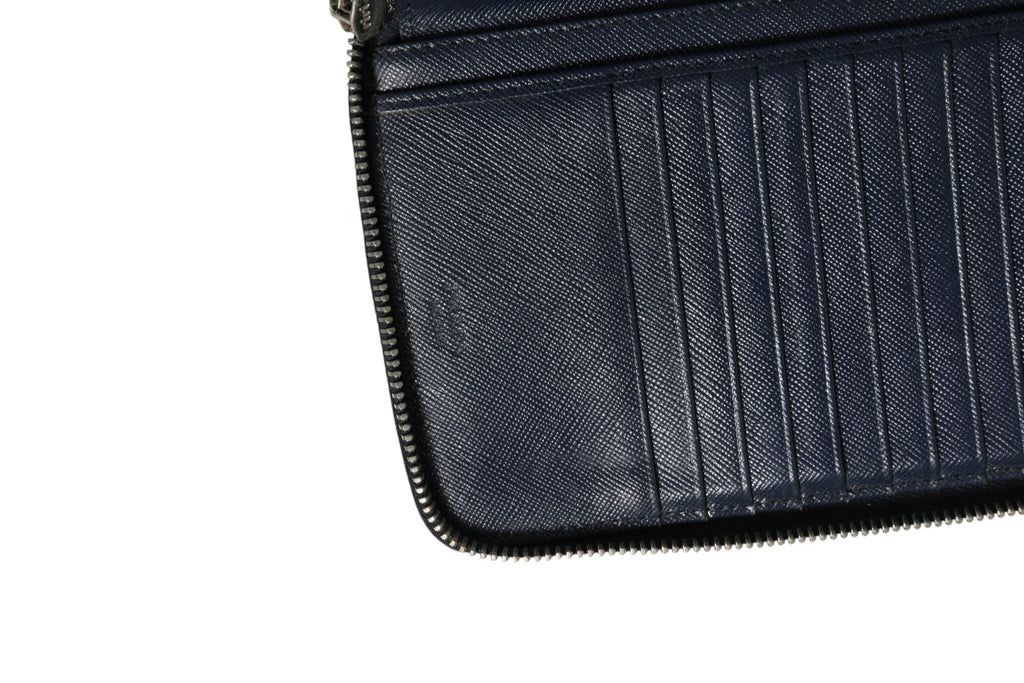 Cartera Oliver de Prada en piel grabada, azul marino, con cierre de cremallera