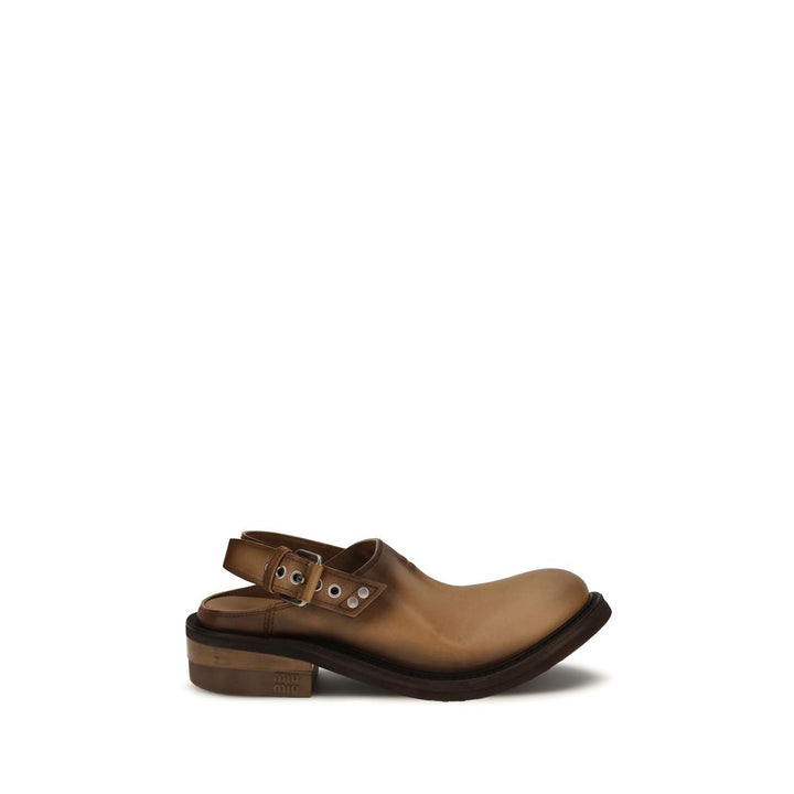 Miu Miu brune mules i kalveskinn av Bos Taurus