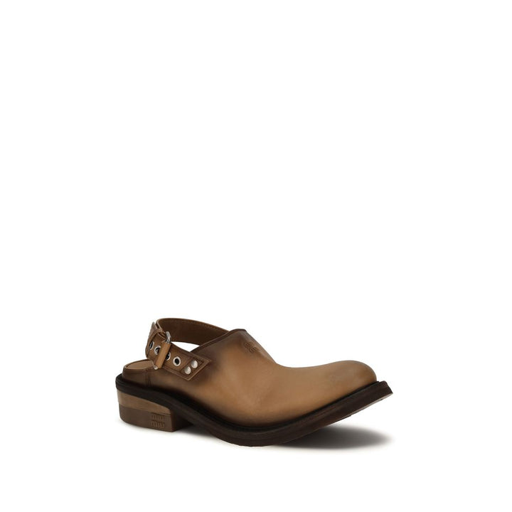 Miu Miu brune mules i kalveskinn av Bos Taurus