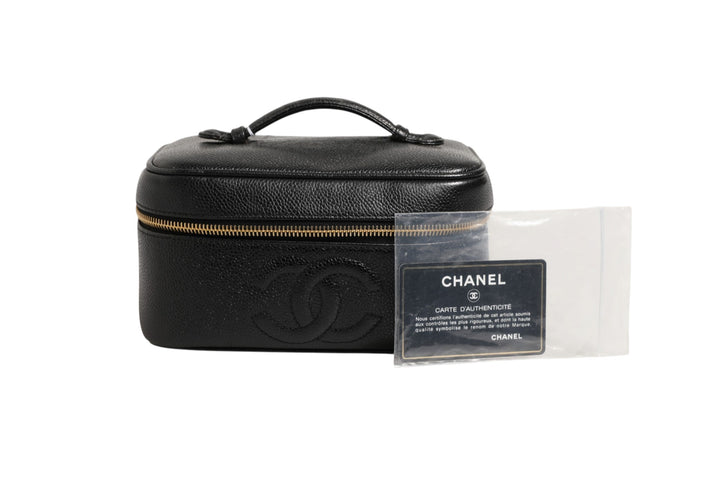 Chanel sminkepung i svart og gull