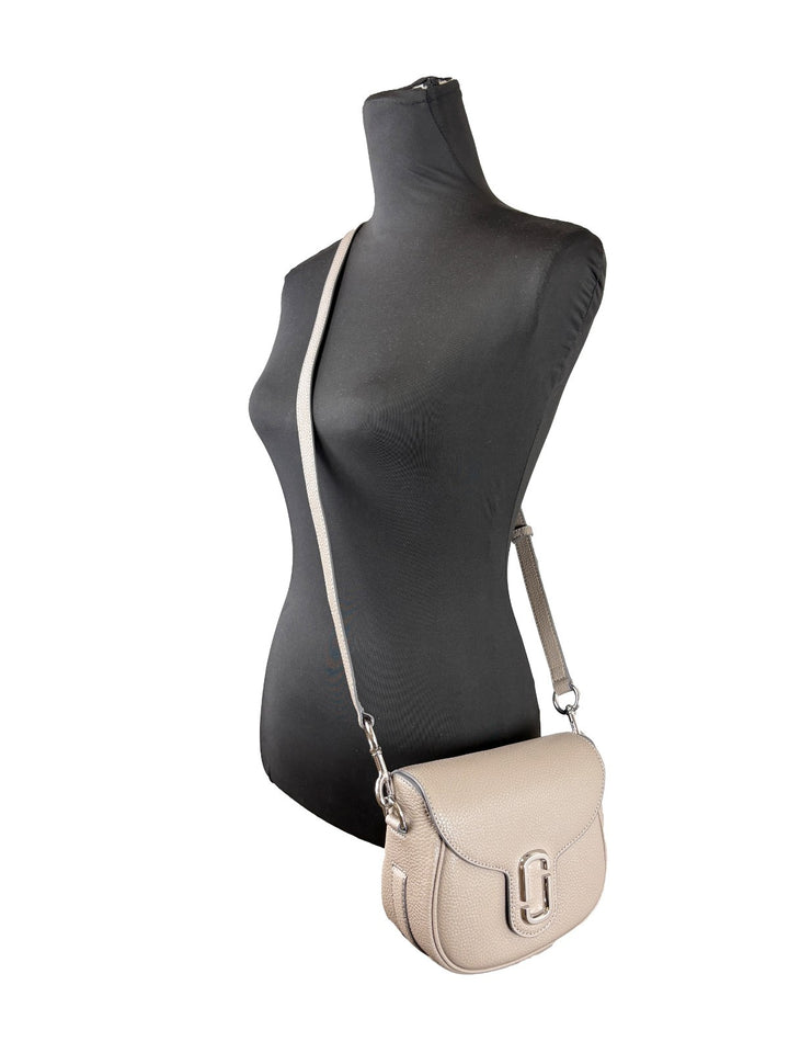 Marc Jacobs skinnveske med saldesign og crossbody-stropp