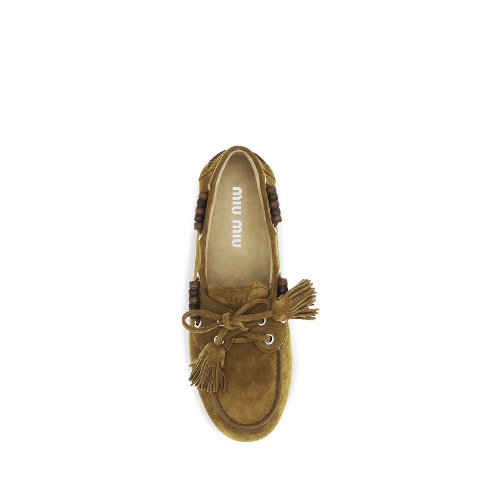 Miu Miu beige kalveskinn Bos Taurus slip-on loafers