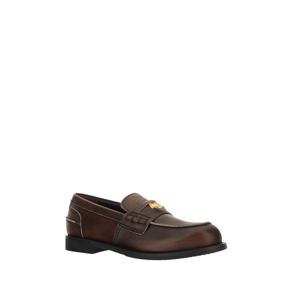 Miu Miu Brunt Kalveskinn Bos Taurus Slip-On Loafers