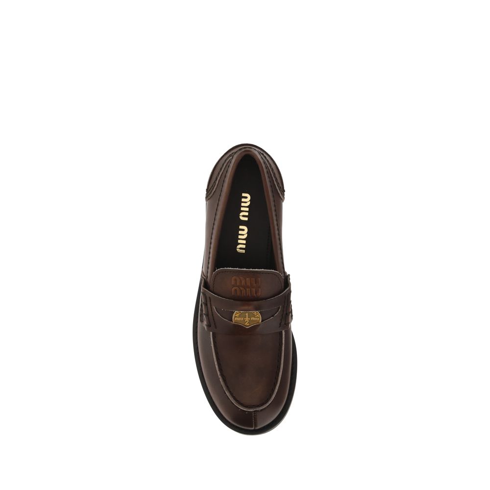 Miu Miu Brunt Kalveskinn Bos Taurus Slip-On Loafers