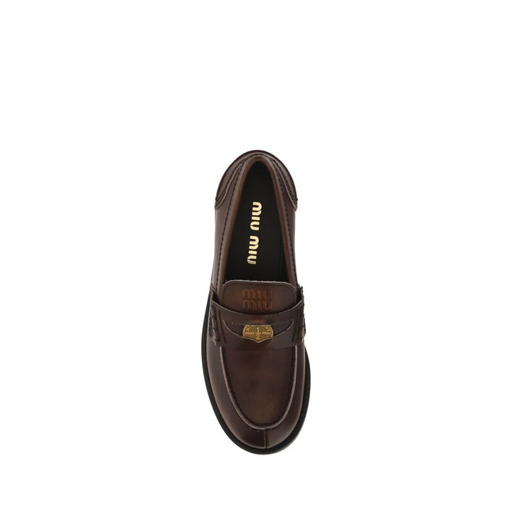 Miu Miu Brunt Kalveskinn Bos Taurus Slip-On Loafers