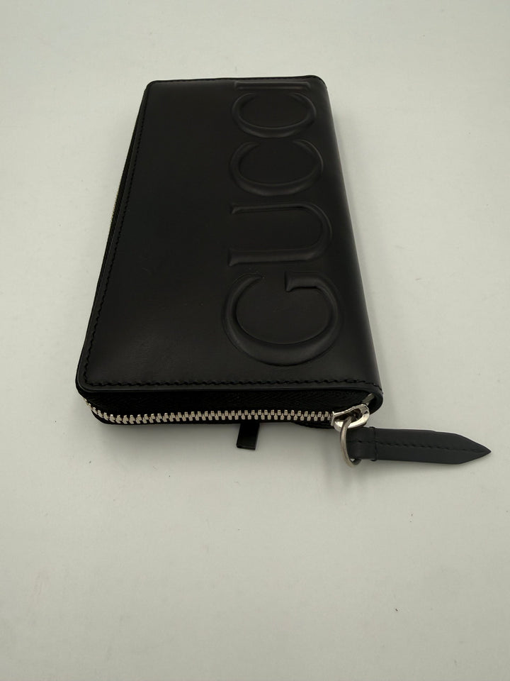Gucci GUCCI Glidelås Sort Pregende Logo Lommebok