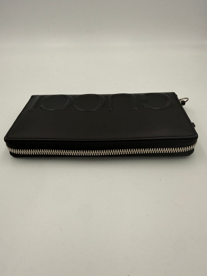 Gucci GUCCI Glidelås Sort Pregende Logo Lommebok