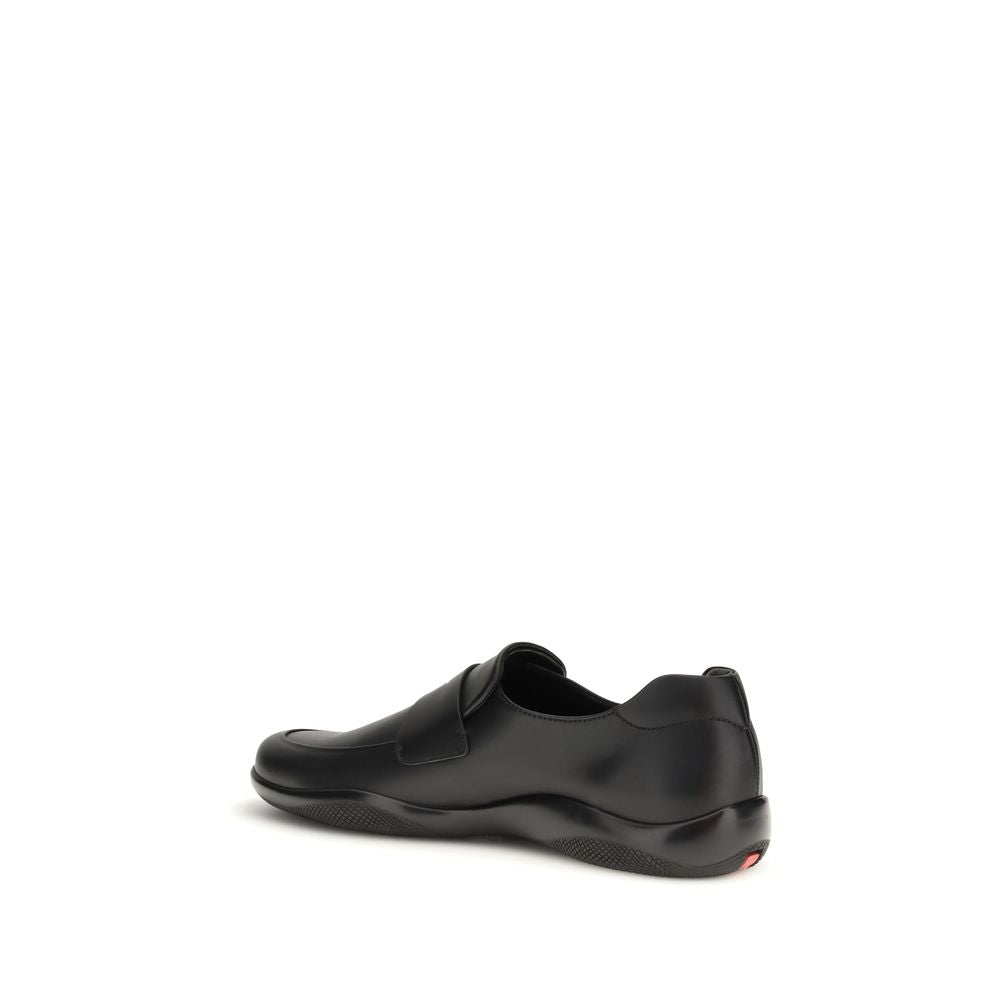 Mocasines Prada sin cordones de piel de becerro negra Bos Taurus